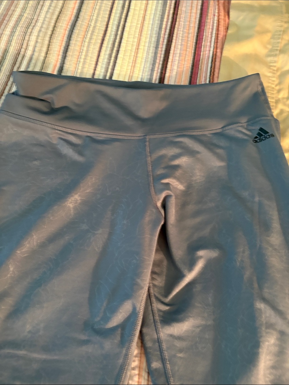 adidas women’s light blue/gray athletic shorts with logo